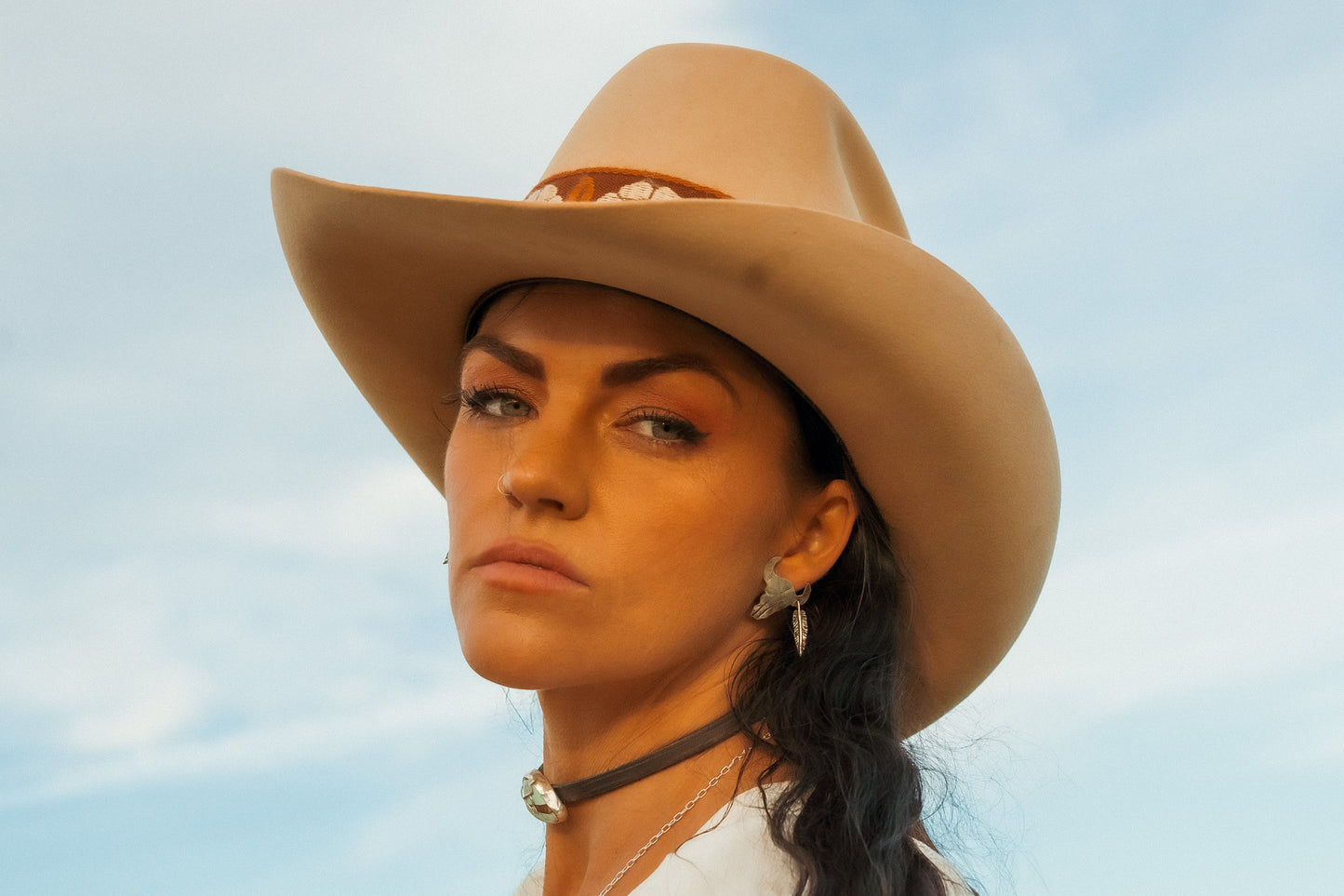 ROAM STERLING SILVER BISON + FEATHER EARRINGS