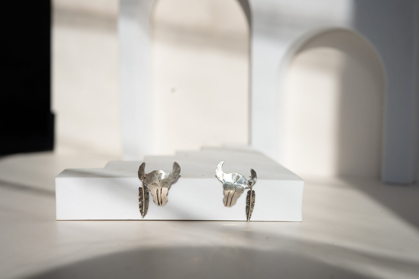 ROAM STERLING SILVER BISON + FEATHER EARRINGS